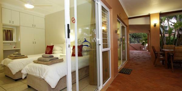 Die Strandhuis Umdloti Luaran gambar